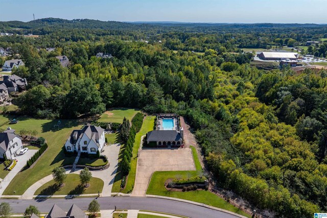 aerial view featuring a forest view