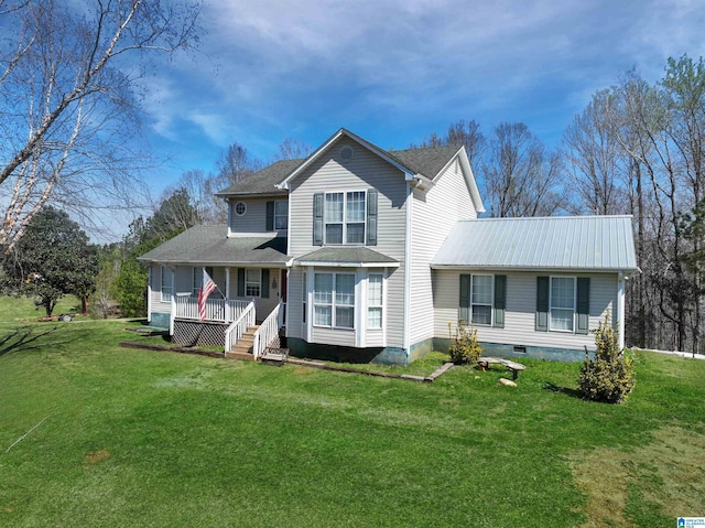 view of front facade with metal roof, crawl space, a front lawn, and a porch
