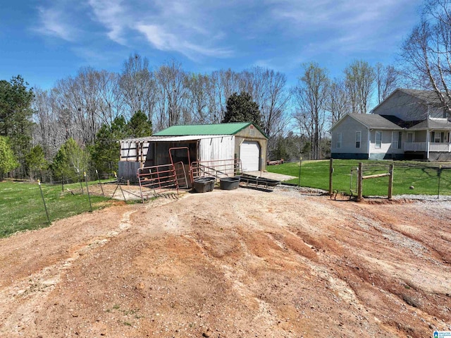 view of outdoor structure featuring an outbuilding and an exterior structure