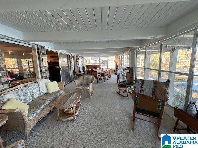 881 Ridgeway Cir, Talladega, AL 35160 - sunroom with carpet and beamed ceiling