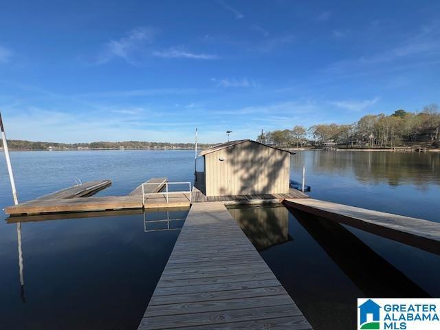 881 Ridgeway Cir, Talladega, AL 35160 - view of dock featuring a water view