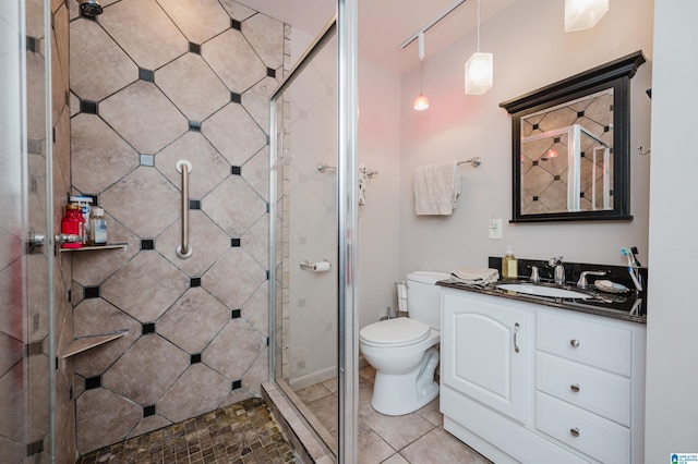 881 Ridgeway Cir, Talladega, AL 35160 - full bath with a stall shower, tile patterned floors, toilet, and vanity