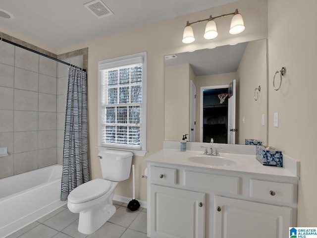 2326 Freestone Ridge Cv, Hoover, AL 35226 - bathroom featuring tile patterned floors, toilet, vanity, shower / bath combo with shower curtain, and baseboards