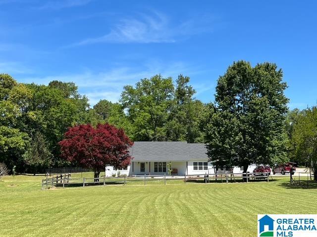 view of community featuring a lawn