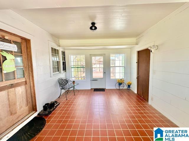 view of unfurnished sunroom