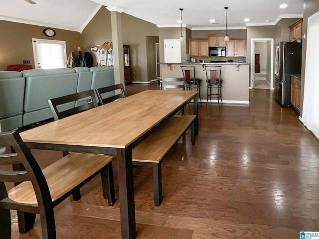 dining space with recessed lighting, dark wood-style flooring, baseboards, and ornamental molding