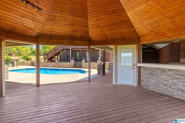 206 Shaw Rd, Pell City, AL 35128 - pool featuring stairway, a wooden deck, and fence