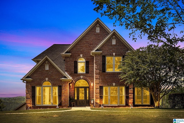 206 Shaw Rd, Pell City, AL 35128 - view of front of property featuring a front lawn and brick siding