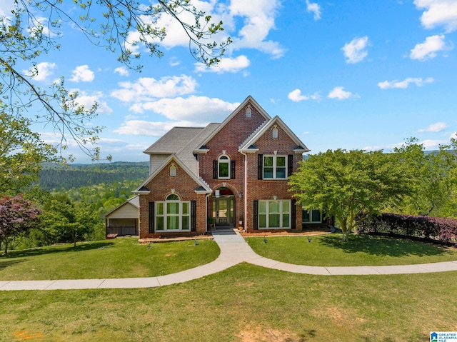 206 Shaw Rd, Pell City, AL 35128 - view of front of home featuring a front lawn and brick siding