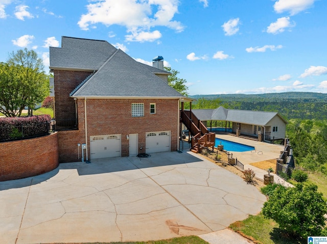 206 Shaw Rd, Pell City, AL 35128 - view of swimming pool featuring stairway, a fenced in pool, and fence