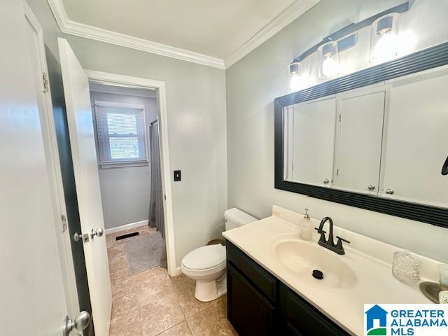 full bathroom with visible vents, crown molding, baseboards, toilet, and vanity