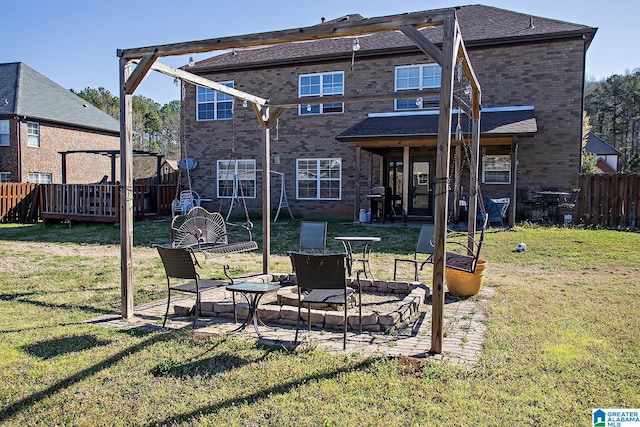 8014 Waterford Dr, Pinson, AL 35126 - back of property with fence, a lawn, a patio area, and brick siding