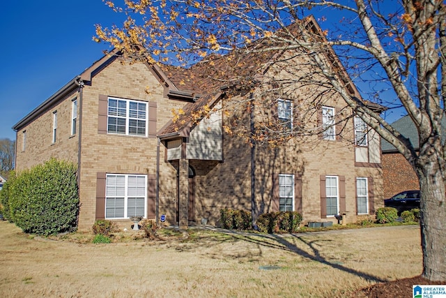 8014 Waterford Dr, Pinson, AL 35126 - view of front of home with brick siding and a front yard