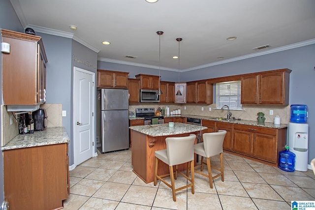 8014 Waterford Dr, Pinson, AL 35126 - kitchen featuring a sink, appliances with stainless steel finishes, decorative backsplash, and visible vents