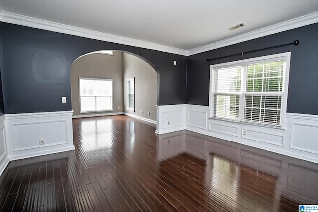 8014 Waterford Dr, Pinson, AL 35126 - unfurnished room featuring arched walkways, ornamental molding, wainscoting, and visible vents