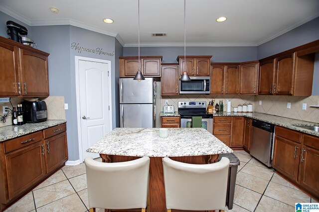 8014 Waterford Dr, Pinson, AL 35126 - kitchen with decorative backsplash, light stone countertops, stainless steel appliances, and light tile patterned flooring