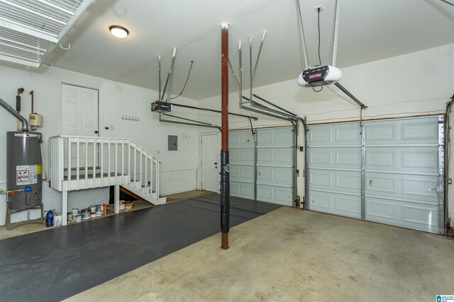 708 Savannah Pl, Vestavia Hills, AL 35226 - garage with a garage door opener and water heater