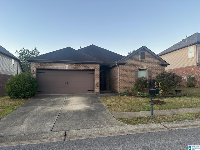 6777 Southern Trace Cir, Leeds, AL 35094 - ranch-style house featuring driveway, brick siding, and a garage
