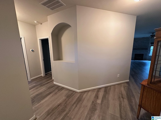 6777 Southern Trace Cir, Leeds, AL 35094 - hall with baseboards, wood finished floors, and visible vents