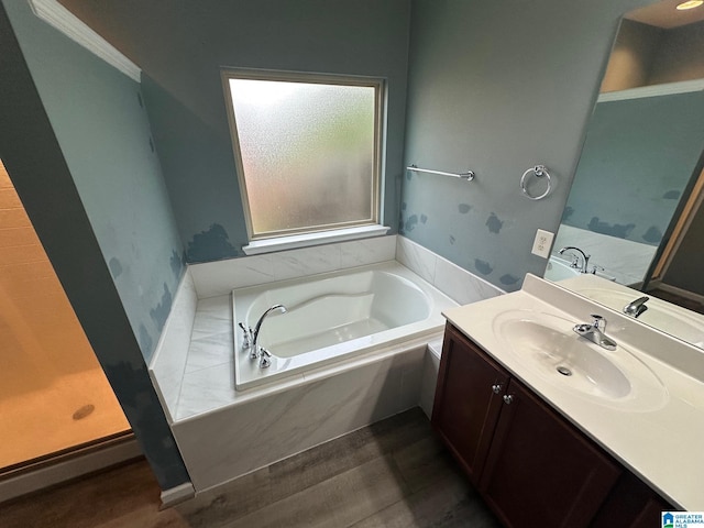 6777 Southern Trace Cir, Leeds, AL 35094 - bathroom with a bath, wood finished floors, and vanity
