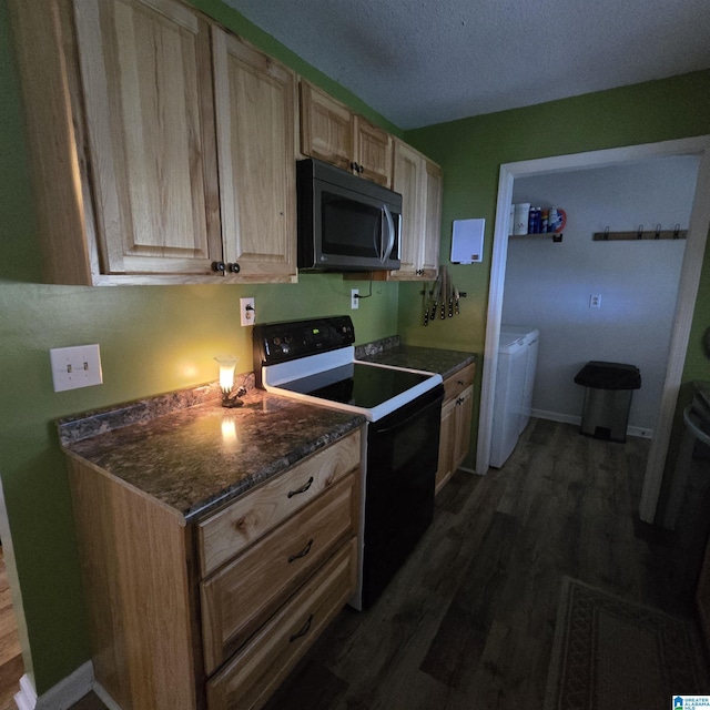 kitchen featuring range with electric stovetop, washer and dryer, light brown cabinets, and dark wood-type flooring