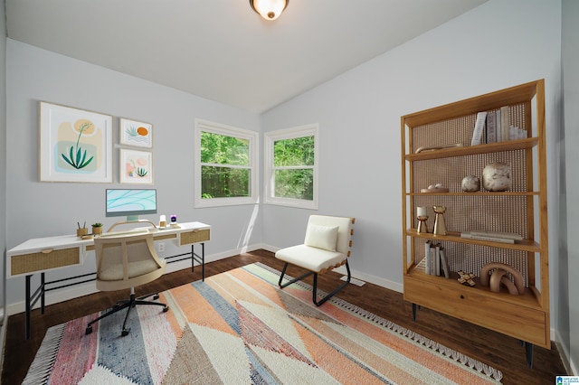 office space with baseboards, wood finished floors, and lofted ceiling