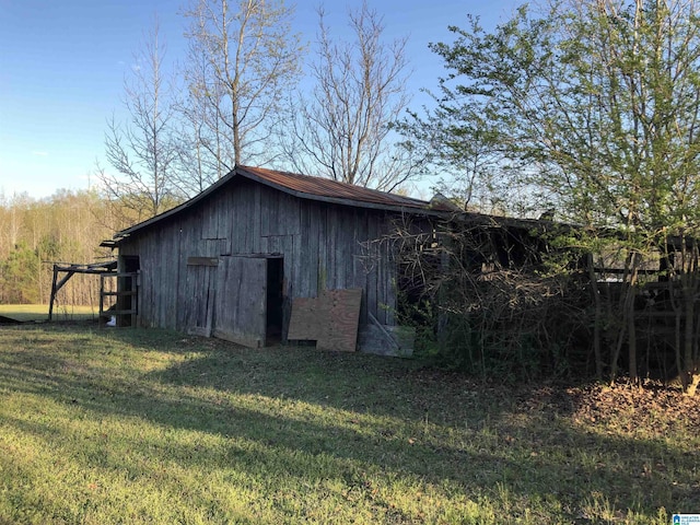 view of outbuilding featuring an outdoor structure