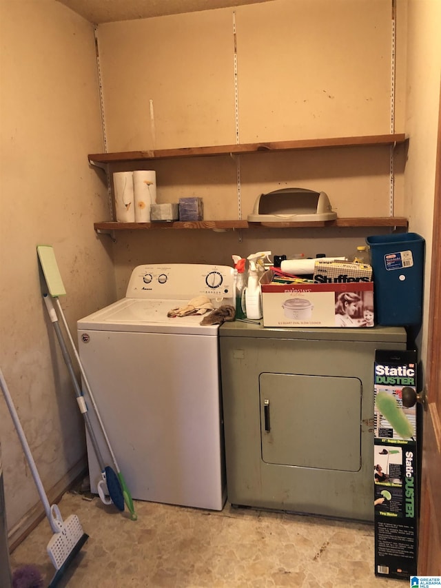 laundry area with washing machine and dryer and laundry area