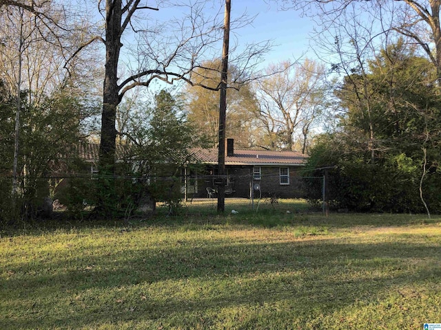 view of yard with fence