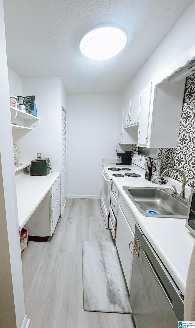kitchen with a sink, dishwasher, white electric range, white cabinets, and light wood-style floors