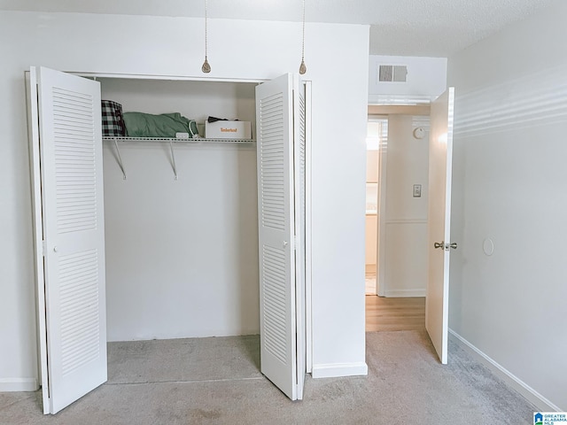closet featuring visible vents