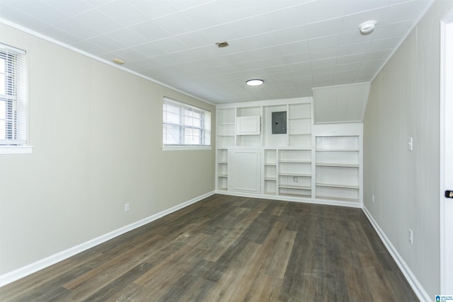 5400 Etta Dr, Mount Olive, AL 35117 - empty room with electric panel, crown molding, baseboards, and dark wood finished floors