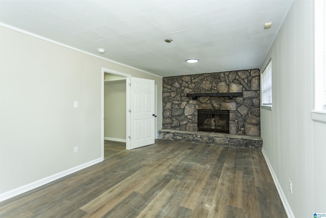 5400 Etta Dr, Mount Olive, AL 35117 - unfurnished living room with baseboards, a fireplace, and wood finished floors