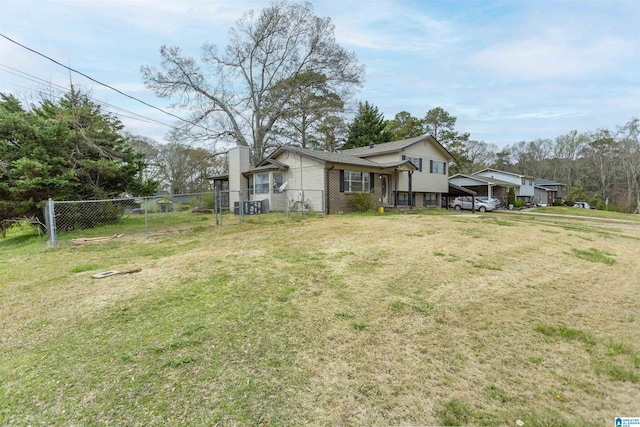 5400 Etta Dr, Mount Olive, AL 35117 - exterior space with fence, a chimney, a front yard, brick siding, and a carport