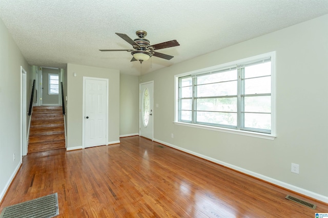 5400 Etta Dr, Mount Olive, AL 35117 - interior space featuring visible vents, a ceiling fan, wood finished floors, and a textured ceiling