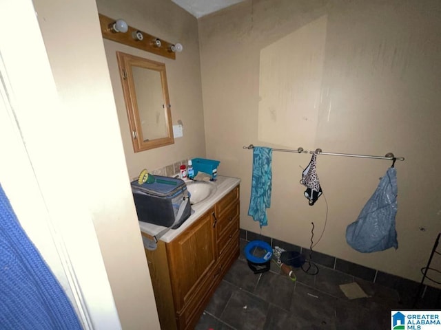 11 Coosa St, Childersburg, AL 35044 - bathroom with tile patterned flooring and vanity