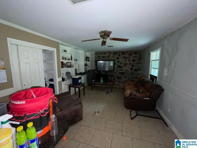 11 Coosa St, Childersburg, AL 35044 - tiled living room with built in features and a ceiling fan