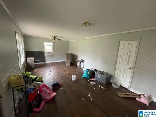11 Coosa St, Childersburg, AL 35044 - unfurnished living room featuring a ceiling fan, wood finished floors, crown molding, and wainscoting