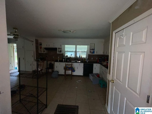 11 Coosa St, Childersburg, AL 35044 - kitchen featuring white cabinetry, dark countertops, black dishwasher, and ceiling fan
