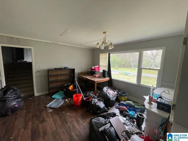 11 Coosa St, Childersburg, AL 35044 - interior space featuring ornamental molding, a notable chandelier, baseboards, and wood finished floors