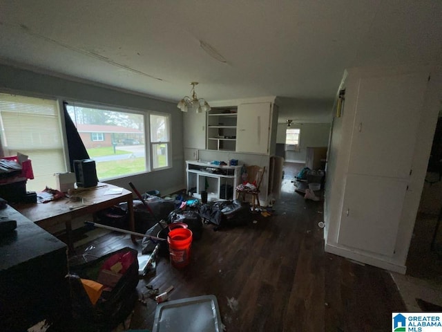 11 Coosa St, Childersburg, AL 35044 - dining room featuring wood finished floors and an inviting chandelier