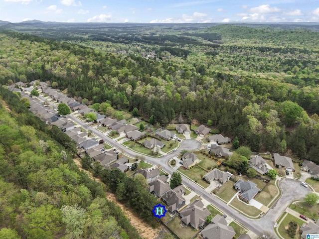 aerial view with a forest view and a residential view