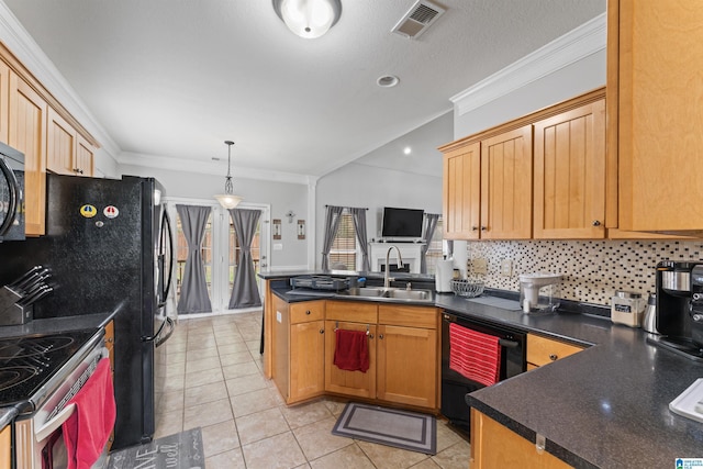 kitchen featuring dishwasher, a sink, dark countertops, stainless steel electric stove, and a peninsula