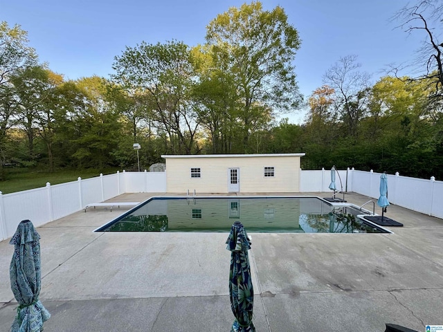 6094 Old Tuscaloosa Hwy, Mccalla, AL 35111 - view of swimming pool with a fenced in pool, an outbuilding, a patio area, and a fenced backyard