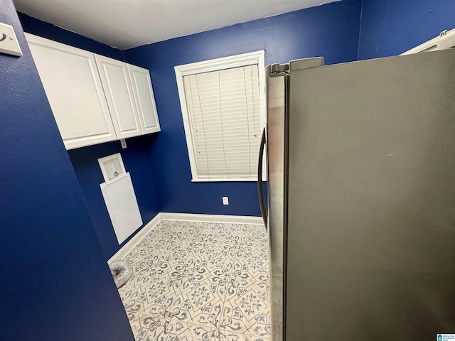 6094 Old Tuscaloosa Hwy, Mccalla, AL 35111 - clothes washing area with washer hookup, baseboards, and cabinet space