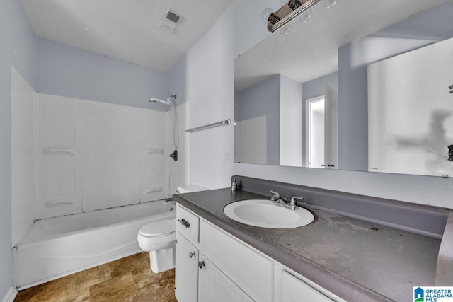 2610 Gaylon St, Birmingham, AL 35235 - full bath featuring toilet, vanity, bathing tub / shower combination, and stone finish flooring