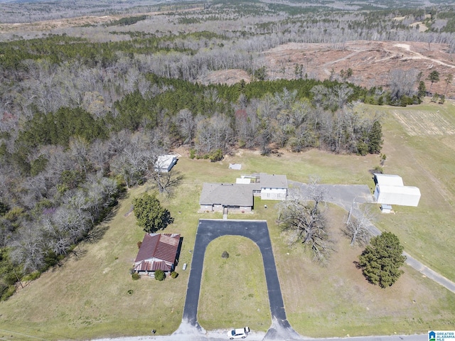 aerial view with a wooded view