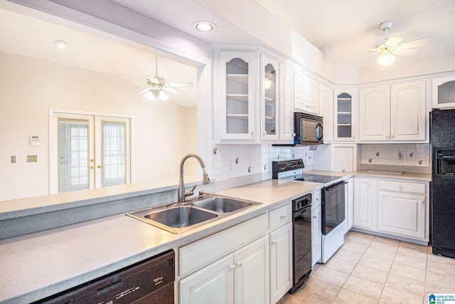 kitchen featuring white cabinetry, black appliances, a sink, and a ceiling fan