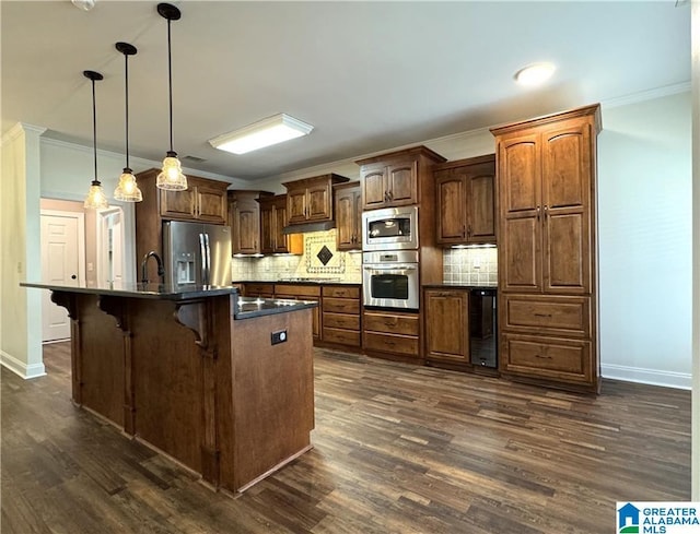 11433 Belle Meade Way, Northport, AL 35475 - kitchen with dark countertops, backsplash, crown molding, and appliances with stainless steel finishes