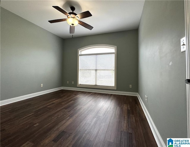 11433 Belle Meade Way, Northport, AL 35475 - empty room featuring baseboards, ceiling fan, and dark wood-type flooring